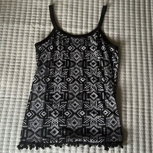 Large black and white No Boundaries tank top.